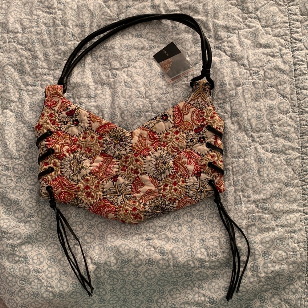 Vintage Beautiful beaded quilted BCBG Max Azria bag with satin lining.